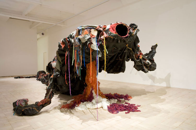 ingubo yesizwe, 2008 leather, rubber, gauze, ribbon, steel, found ball and claw chair leg, butcher's hook, chain 150x260x3000 cm